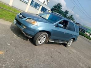 A picture of Neatly used Toyota MDX 2004 model with sound engine available