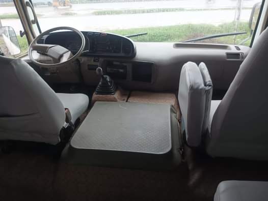 A picture of 2010 Toyota Coaster Bus 15.5m net price With active AC
