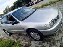 A picture of Very sharp and clean Toyota Corolla fish eye untempered Engine