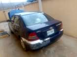 A picture of PARTIALLY FIRST BODY NIGERIA USED TOYOTA COROLLA 2005 Engine dey