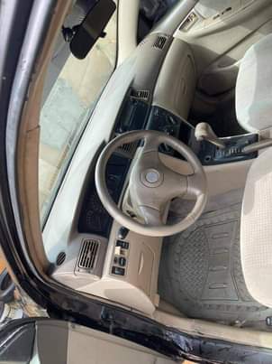 A picture of 2006 Distress Toyota Corolla LE