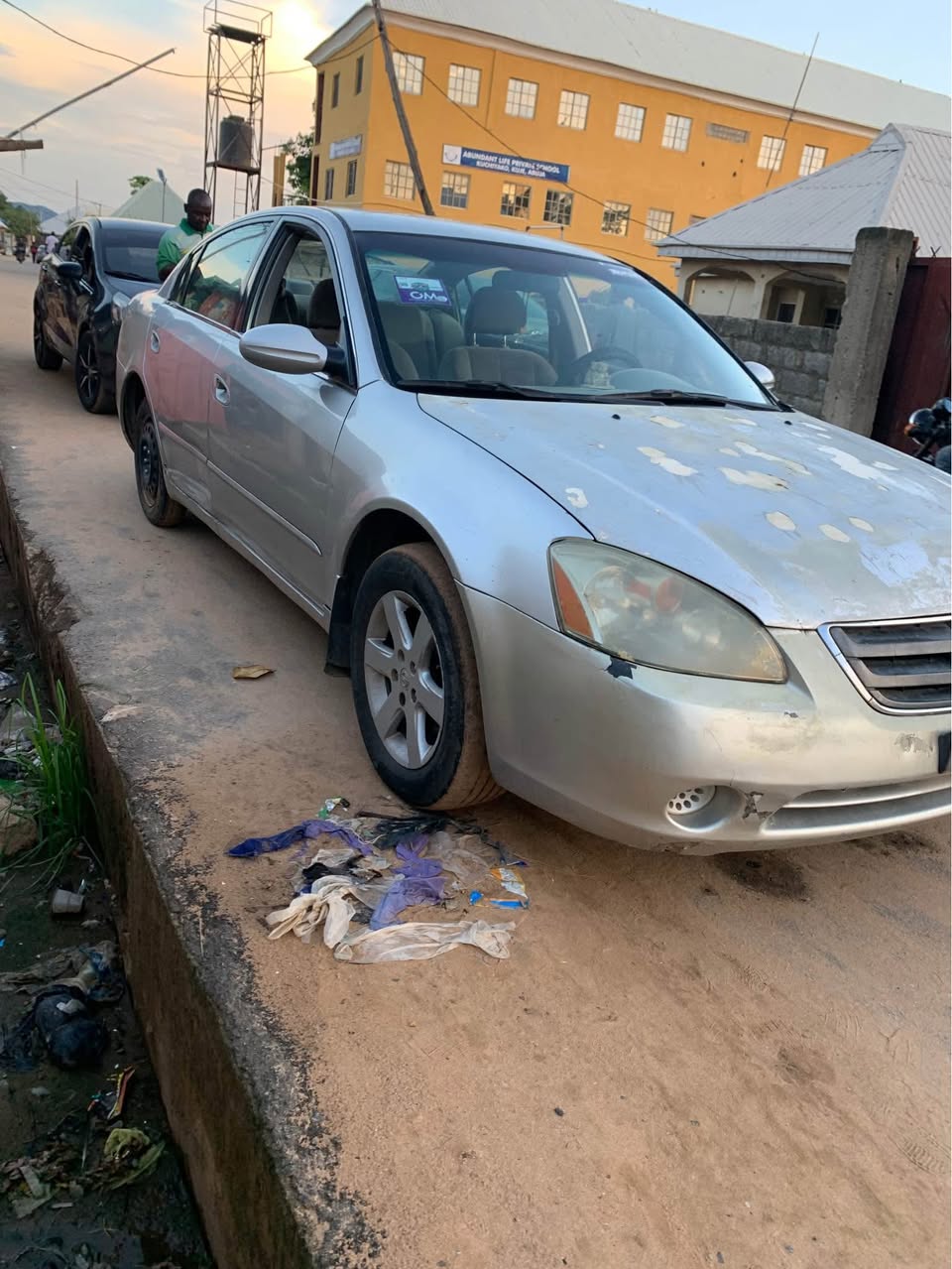 A picture of Faded body Nissan Altima 2004 Very sharp On distress 07014406402
