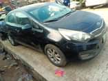 A picture of Kia tapping engine and transmission and ac is work okay