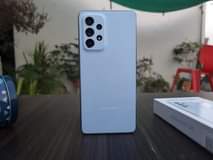 A picture of OWN AND NOW NOW SMARTPHONE AND BACK SMALL SMALL ON