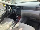 A picture of Toyota Corolla 2004 Painted on first body Engine gear and