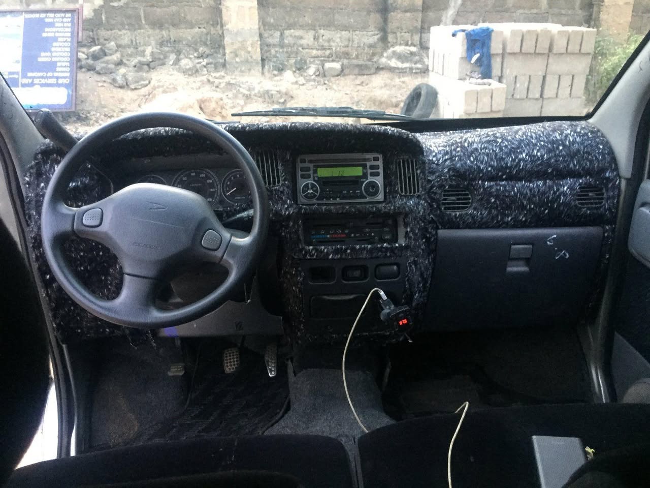 A picture of 2006 Daihatsu atria 4 plug
