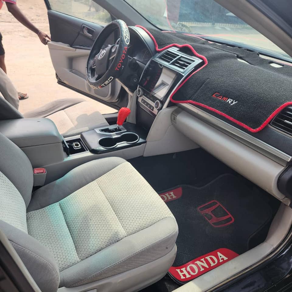 A picture of A well used 2013 camry with engine gear ac intact.