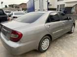 A picture of Neatly used Toyota Camry 2004 model V4 cylinder engine AC
