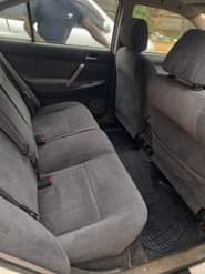 A picture of Make TOYOTA Brand PREMIO Year 2004 Color WHITE Grade 2WD