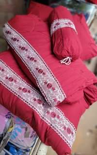 A picture of 13pc cotton duvets Package has Two bedsheets Four pillowcases Two
