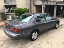 A picture of TOYOYA CAMRY LE 2000 FOR SALE 2349035015509 4plug engine automatic