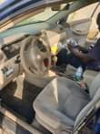 A picture of Dealers Deal 04 corrola painted with sound engine n gear