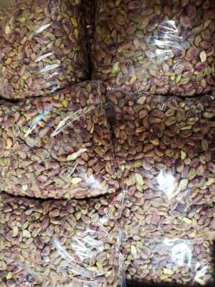 A picture of Pistachio kernels medjool dates and ajwa dates fresh stock available