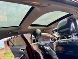 A picture of 2016 registered Mercedes Benz GLA250 pepper red on black