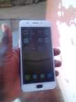 A picture of Oppo f1s with some cracks but working fine