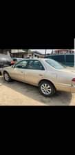 A picture of Super clean Toyota Camry tiny light