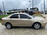 A picture of Toyota corolla 2006 Gold Colour blue Condition Nigerian Used pure