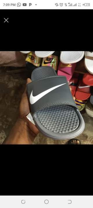 A picture of Nike slides