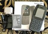 A picture of Nokia 106 mpya full box kwa elfu 27 reja jumla