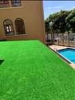 A picture of High quality artificial grass carpets. Asquare metre costs 65k. Delivery