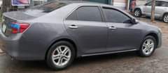 A picture of FIRST BODY TOYOTA CAMRY 2013 IN GOOD WORKING CONDITION BUY