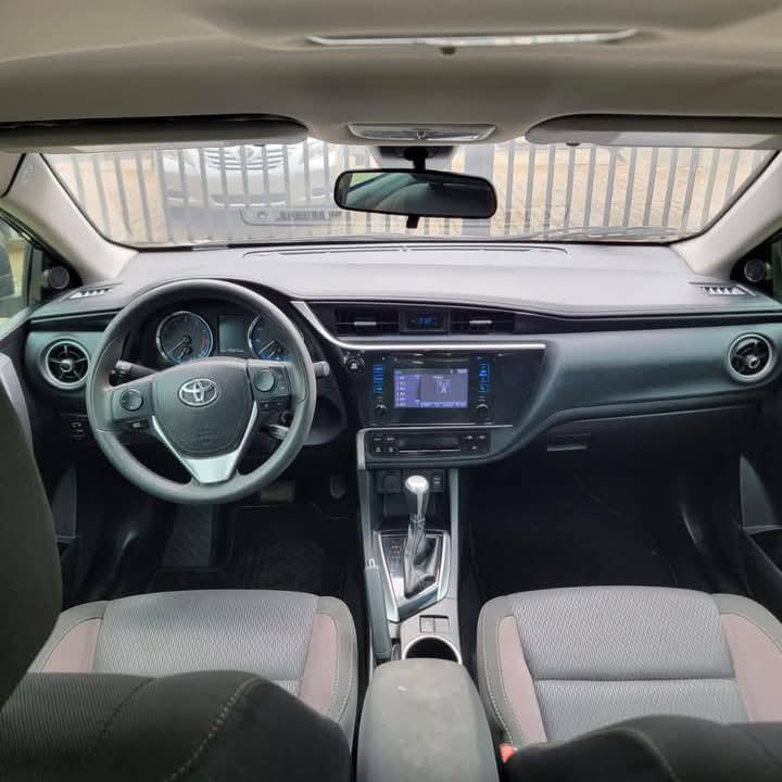 A picture of DIRECT TOKUNBO 2018 TOYOTA COROLLA Extremely clean interior and Exterior