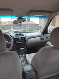 A picture of Nissan Sentra very clean and neat automatic with A c