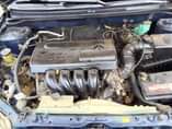 A picture of Toyota Corolla le Engine and gear perfect AC working chilling