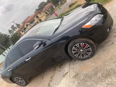 A picture of Tokunbo standard 09 toyota camry AC gear and engine perfect
