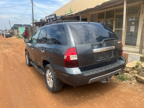 A picture of 100 First body registered 2003 Acura MDX