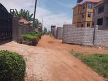 A picture of Quick sale 18 5m Plot located garuga on entebbe rd