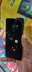 A picture of Samsung galaxys9 with dots as seen at just 380k 64gb