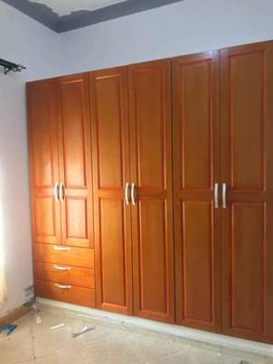 A picture of Mahogany doors wardrobes and kitchen cabinets