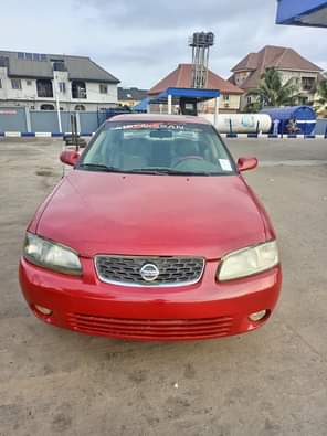 A picture of URGENT SALE Clean Reg 03 Nissan Sentra 4 plugs fabrics
