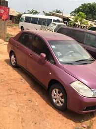 A picture of  STILL AVAILABLE. Clean Nigerian Used Nissan Tiida Fabric interior.