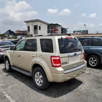 A picture of AVAILABLE NOW FORD ESCAPE 2010 MODEL FOREIGN USED MILK INTERIOR