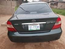 A picture of 9ja used Toyota Camry 2004 model with tapping engine Ac
