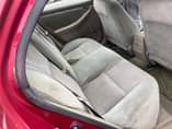A picture of Sharp 2004 Toyota Corolla with sound engine and gear AC