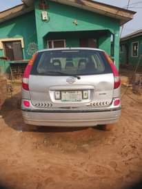 A picture of Nigerian Used Nissan Almera First body Fabric interior MANUAL TRANSMISSION