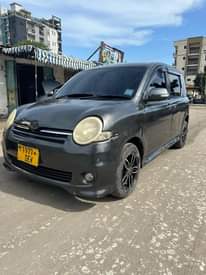 A picture of Toyota sienta mwaka 2006 full option full Ac mirango ya