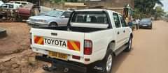 A picture of Hilux...2004 Model...NOTE ..2400 Cc Diesel Engine...Call...0703273550