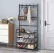 A picture of 4 layer black white hats rack lron metal adjustable shoe