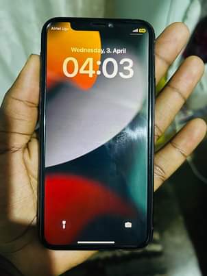 A picture of Iphone 11 pro 256 storage no face 1m 0781627418 or