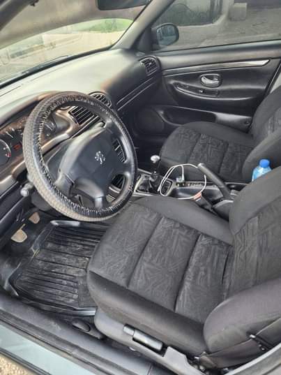 A picture of FASTEST FINGERS EXTREMELY CLEAN USED 406 MANUAL TRANSMISSION 2004 MODEL