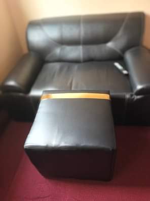 A picture of Leather sofa and it s prof on sale price 250k