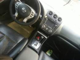 A picture of Nissan altima 2010 model Engine and gear is percent AC