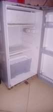 A picture of Adh fridge 120litres and a bike