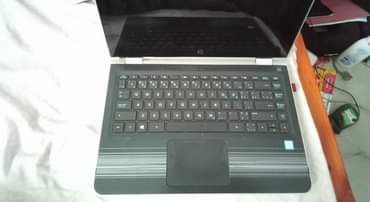 A picture of Natafuta housing na keyboard yake DESKTOP HVLRV5L HP PAVILION X360