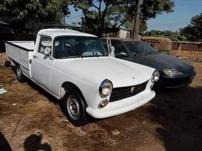 A picture of POUGEOT PICKUP AVAILABLE FOR SALE PRICE 400 000 CONTACT 09061893712