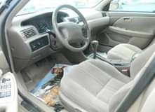A picture of 2000 Toyota Camry LE with factory fitted AC Power windows